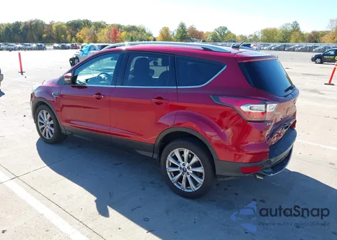 2017 Ford Escape Titanium z USA, uszkodzony, nr VIN 1FMCU0J90HUB46641